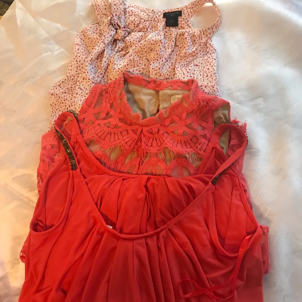 SOLD.  Three sleeveless blouses